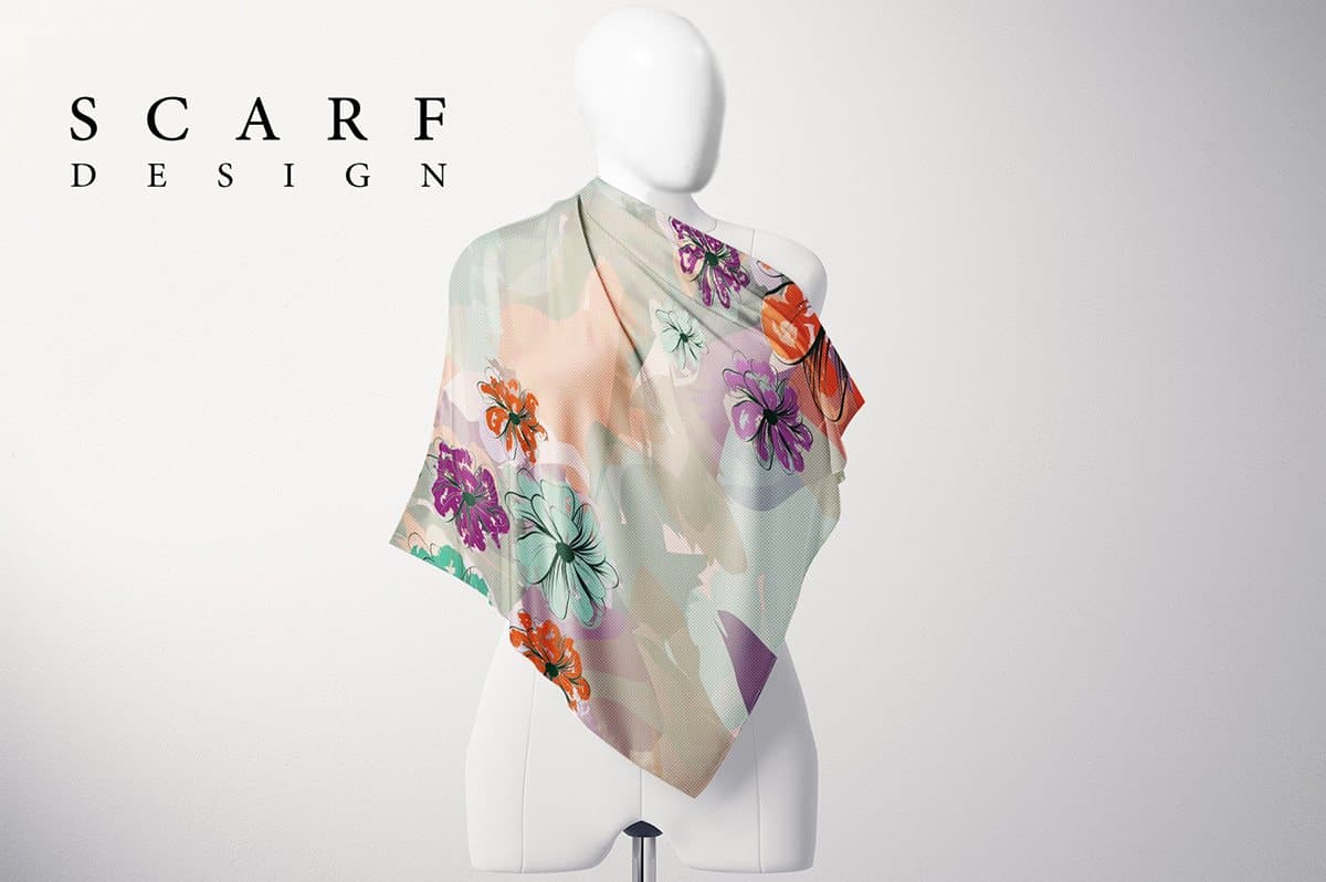 A scarf with soft painted flowers draped on a mannequin, with “Scarf design”.