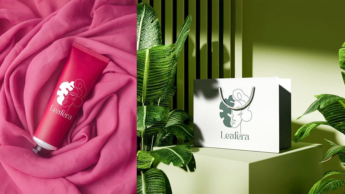 A pink tube on pink fabric and a white shopping bag among green leaves.