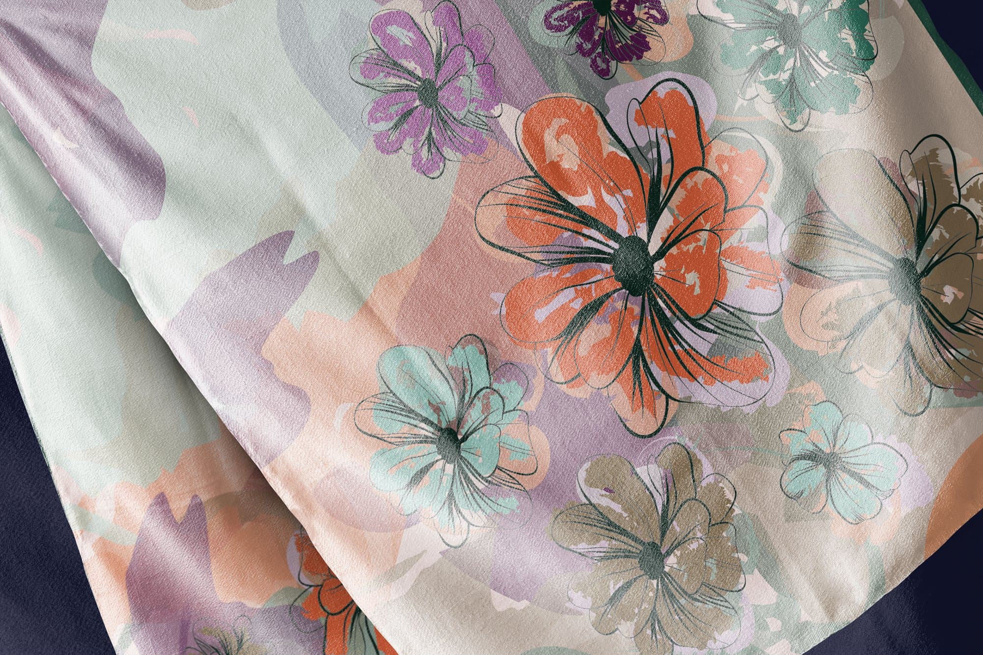 Close-up of the flower scarf: orange, lilac and mint petals.